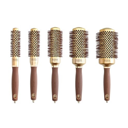 Five brown radial hairbrushes with gold accents and trim